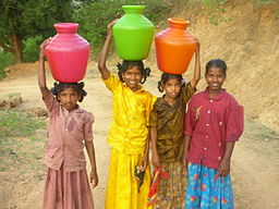Girls carrying water in Bangladesh.